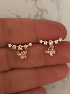 Arch earrings with charms
