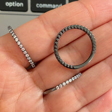 Load image into Gallery viewer, Pave-set ring with clear zircon stones on onyx coloured silver