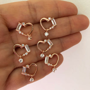 Heart shaped stud with princess cut stones
