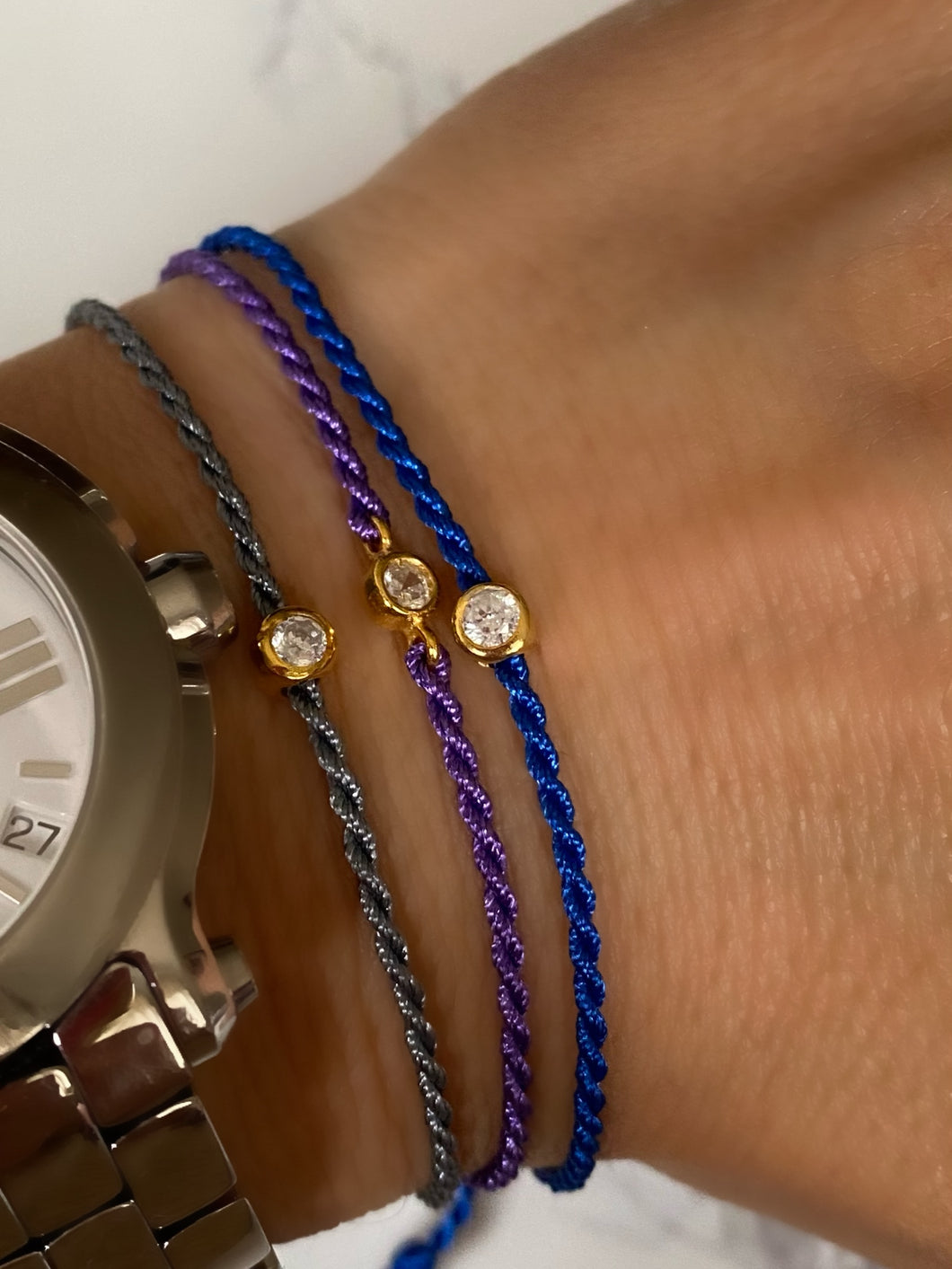 Friendship bracelets with single zircon stones