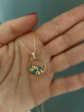 Cargar imagen en el visor de la galería, Pendant with turquoise hearts on a circle
