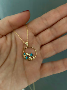 Pendant with turquoise hearts on a circle