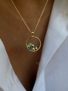 Pendant with turquoise hearts on a circle