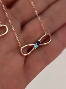Minimalist infinity necklaces with rainbow stones