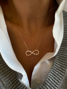 Infinity necklace with princess cut stones
