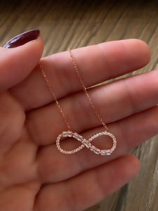 Infinity necklace with princess cut stones