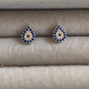 Evil eye studs with dark blue and clear stones